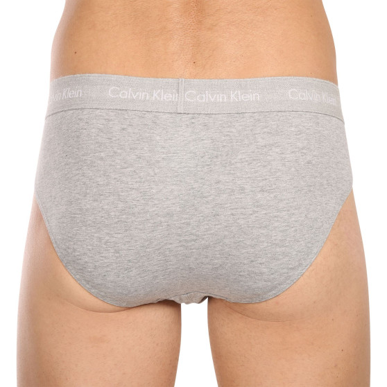 7PACK slip uomo Calvin Klein multicolore (NB3884A-N6S)